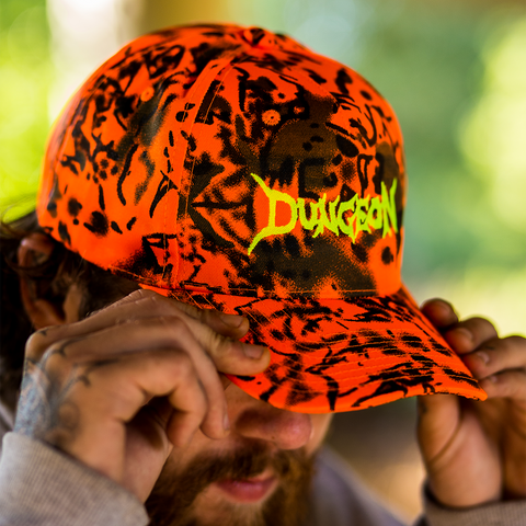 DUNGEON LOGO -  ORANGE FOREST CANVAS CAMO CAP