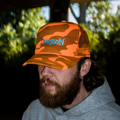 DUNGEON LOGO - ELECTRIC BLUE / ORANGE CAMO TRUCKER CAP